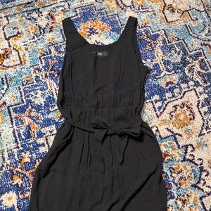 Simple, comfortable, and cute little black dress with tie belt.